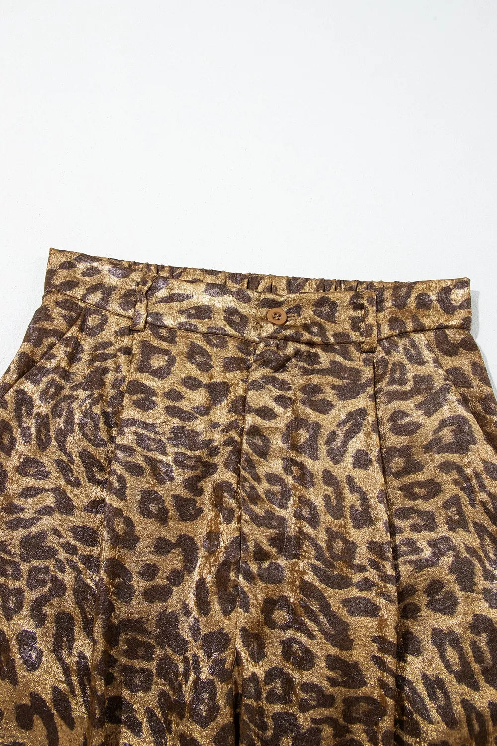 Multicolour leopard print western style wide-leg full-length pants with bold pattern and relaxed fit.