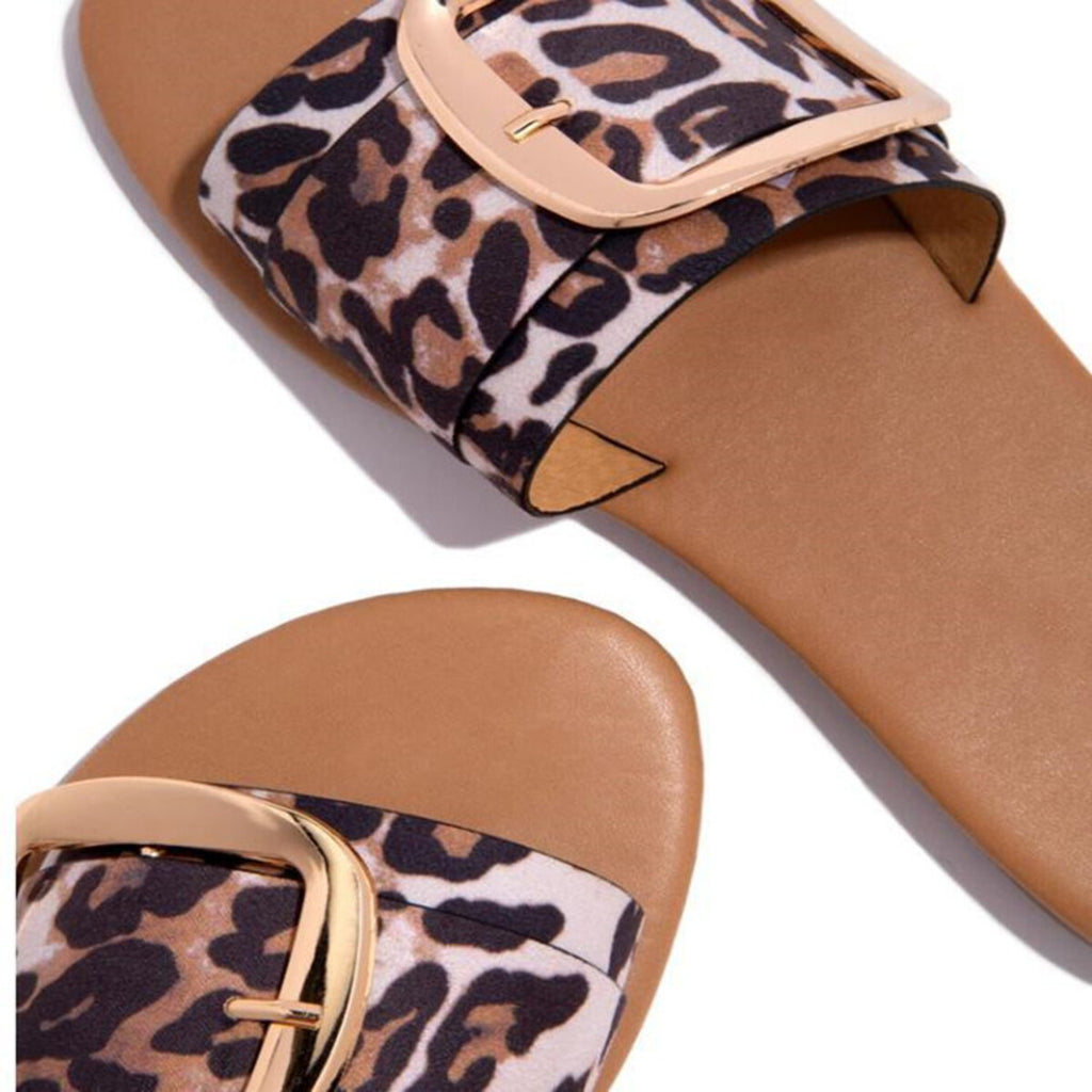 Open toe buckle sandals by Plush Fashion Hub featuring stylish straps and a comfortable flat sole.