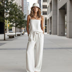Women's casual FitiqueFit spaghetti strap cami top and wide-leg pants two-piece set, featuring a relaxed fit and stylish design.