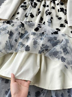 Elegant floral mesh two-piece dress and blazer set by Trendsi, featuring a stylish dress with matching blazer and floral details.