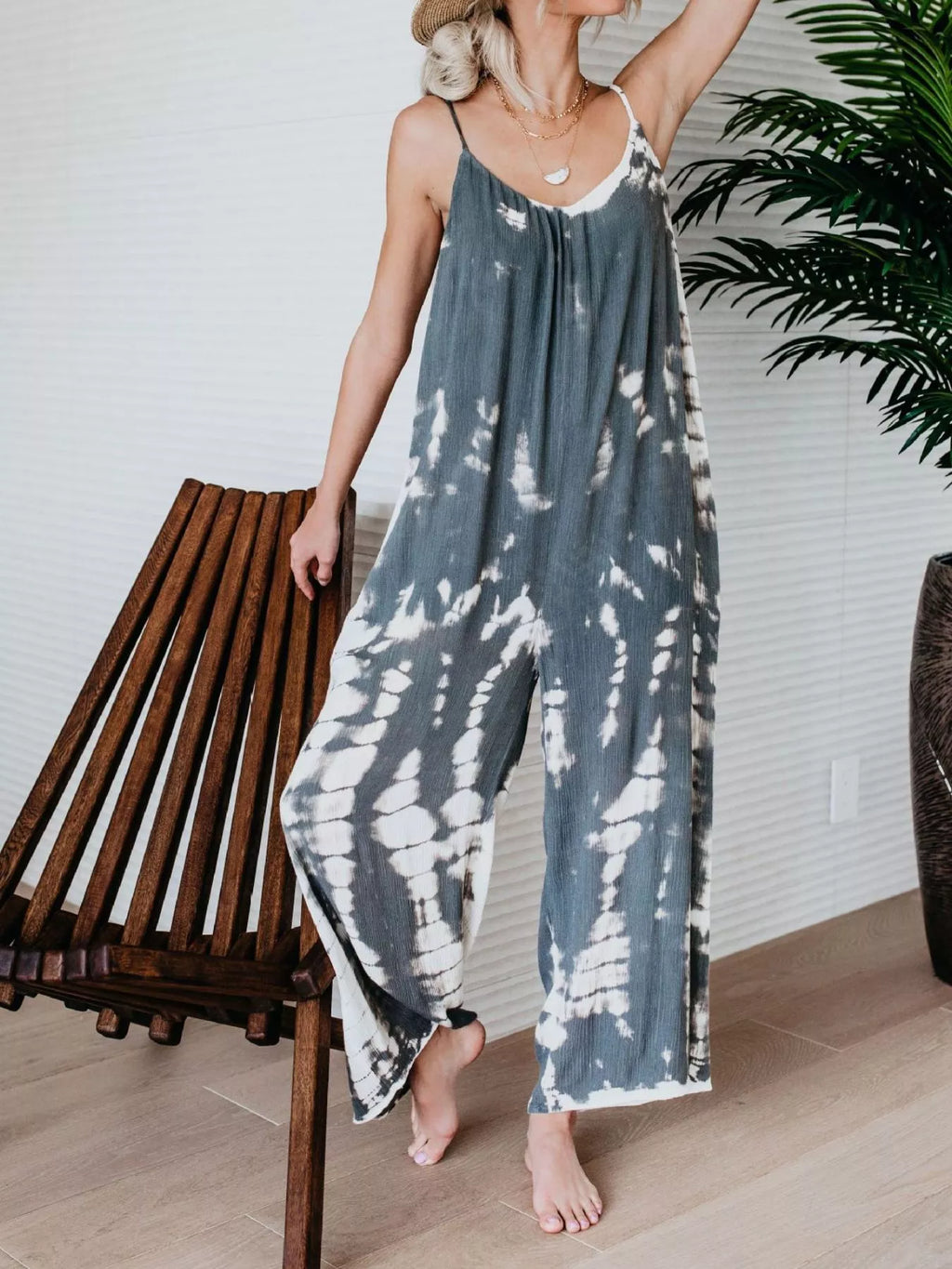 Full size Shopimist tie-dye wide-leg jumpsuit with a relaxed fit, featuring vibrant colors and a comfortable, flowing silhouette.