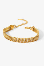 18K gold-plated wide chain bracelet with bold links, stylish jewelry piece from Shopimist displayed on a neutral background.