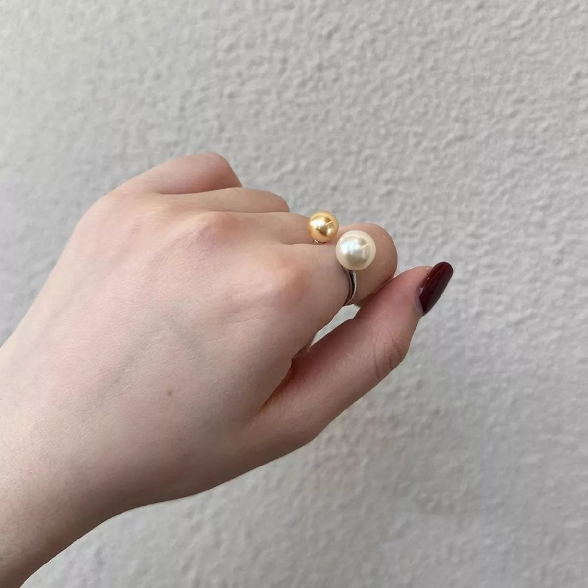 Elegant double pearl open ring from Shopimist featuring two lustrous pearls on a sleek silver band.