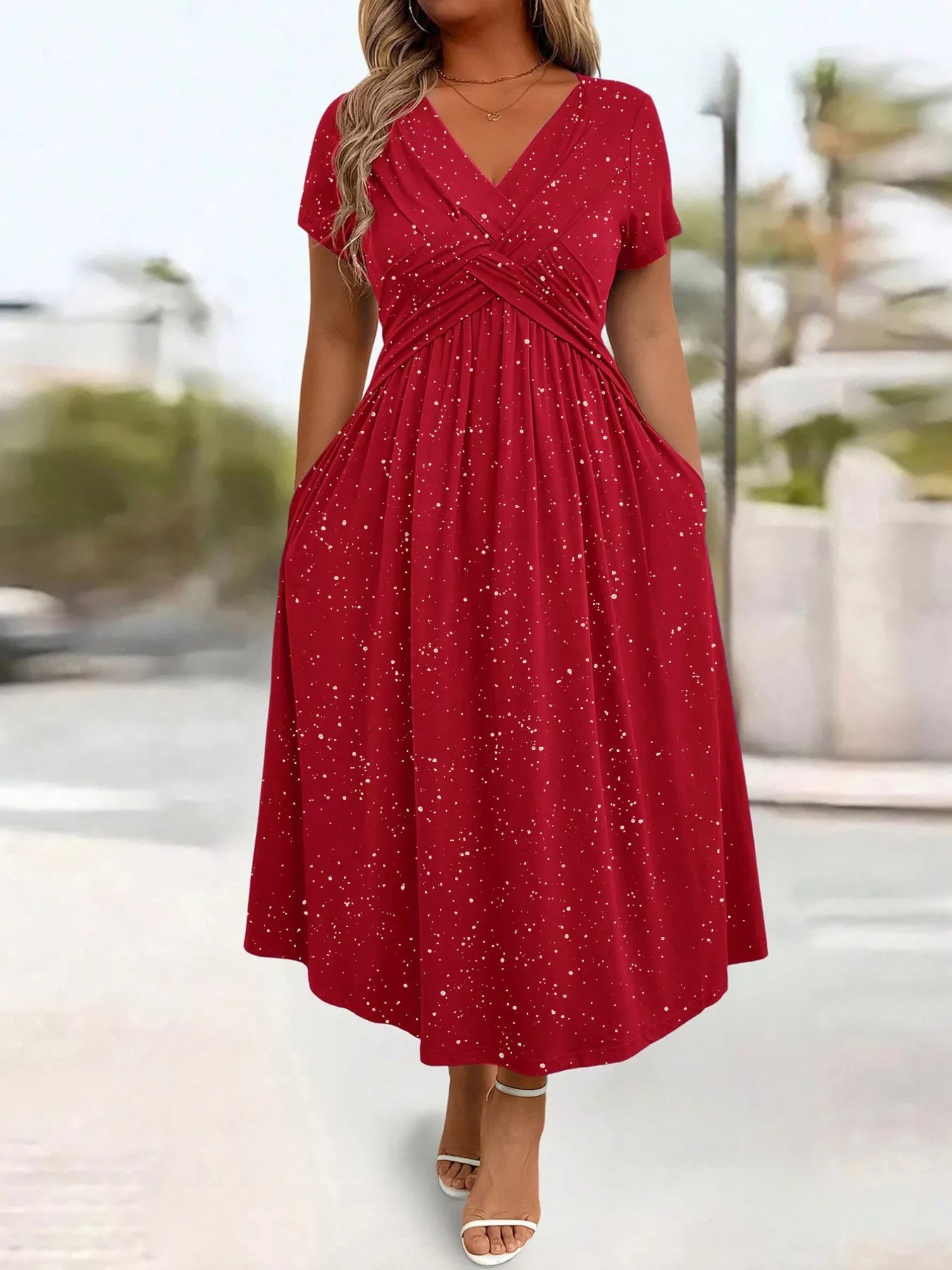 Plus size glitter flutter sleeve midi dress by Trendsi, featuring a full-length dress with shimmering fabric and flutter sleeves.