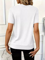 Women's ribbed half zip short sleeve casual top by Trendsi, soft stretch pullover in a fitted, comfortable style.