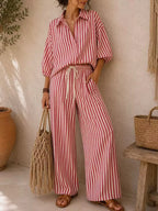 Plus size striped puff sleeve shirt and wide-leg drawstring pants set by Trendsi, featuring a coordinated matching design.