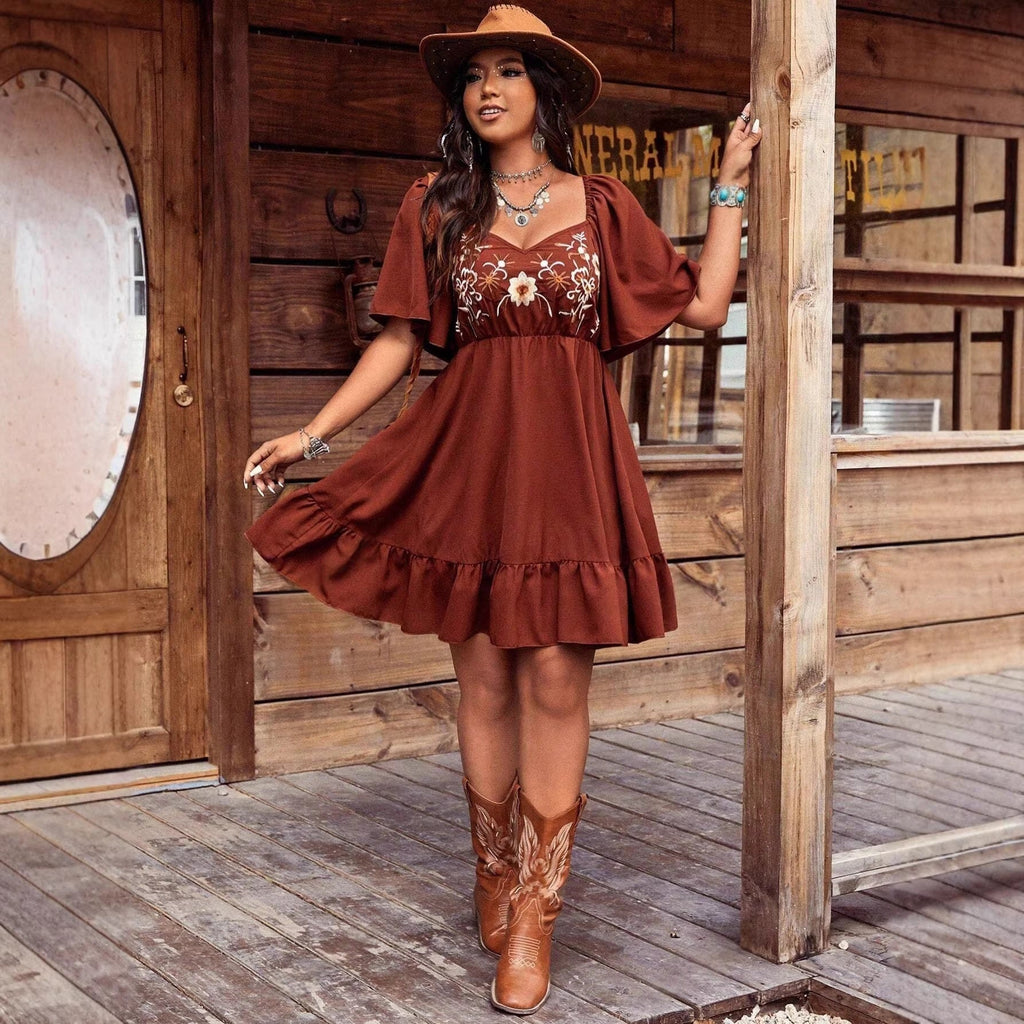 Women's floral embroidered ruffle short-sleeve midi dress by FitiqueFit, featuring colorful floral embroidery and ruffle details.