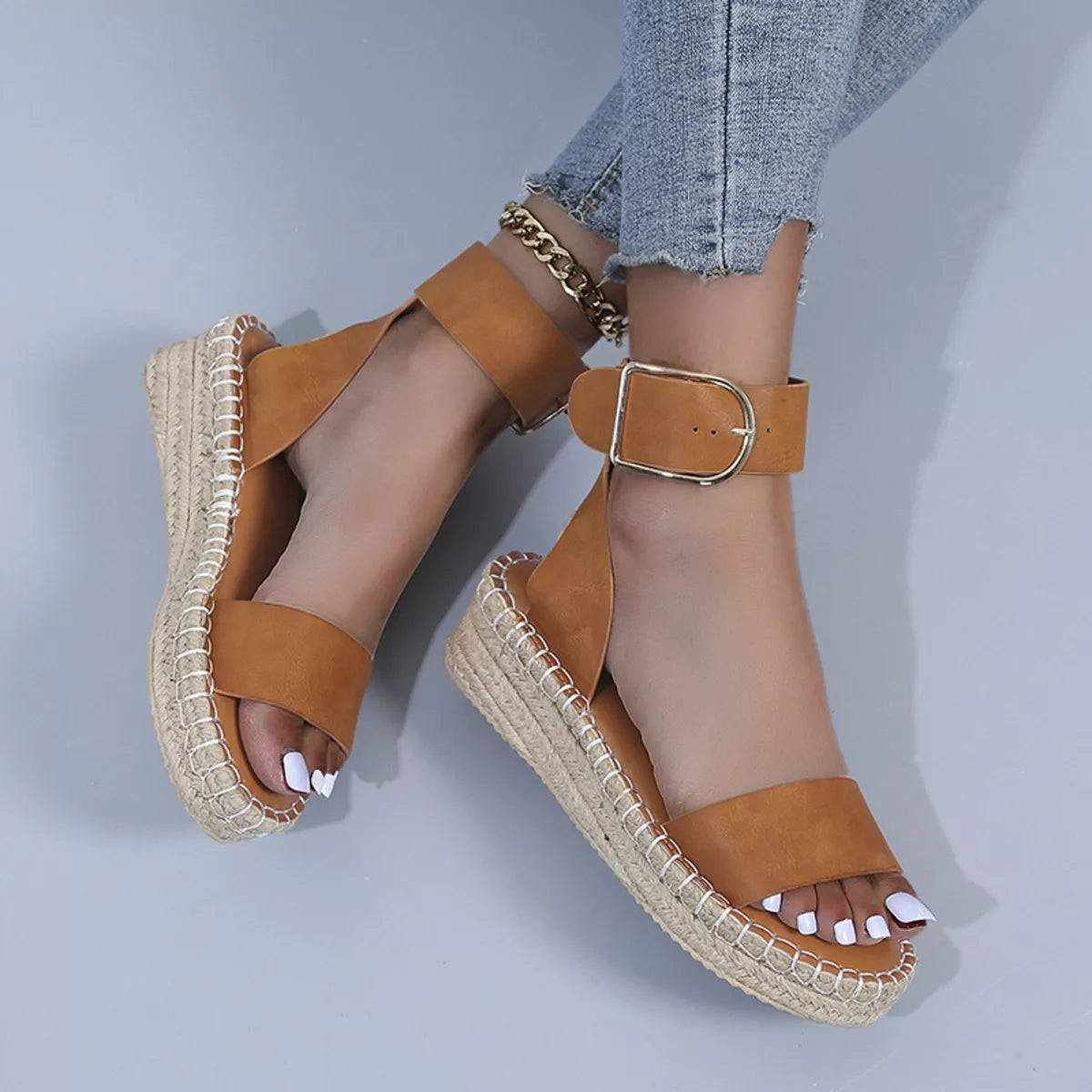 Open toe openwork sandals by Shopimist featuring stylish cutout design and comfortable flat sole for casual wear.