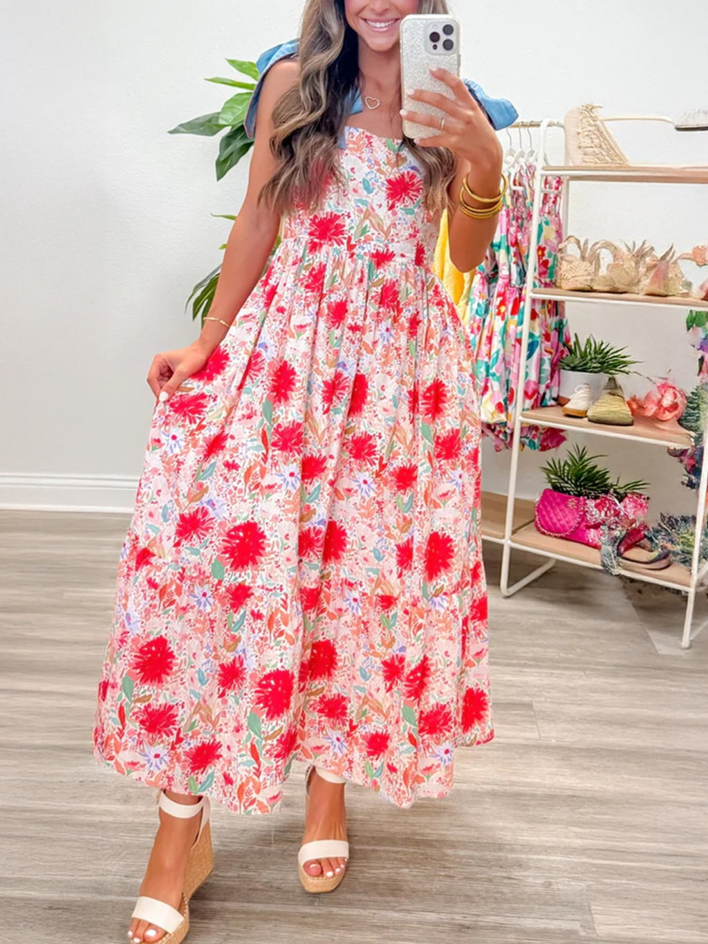 Floral print tie-shoulder midi dress with pockets, lightweight summer dress by Trendsi, shown hanging on a hanger.