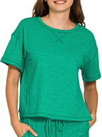 Women's cotton slub short sleeve tee and pants loungewear set by Trendsi, featuring a relaxed fit and comfortable fabric.