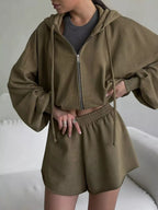 Trendsi zip-up long sleeve outerwear and matching shorts set, casual athletic wear, shown in a comfortable, stylish design.