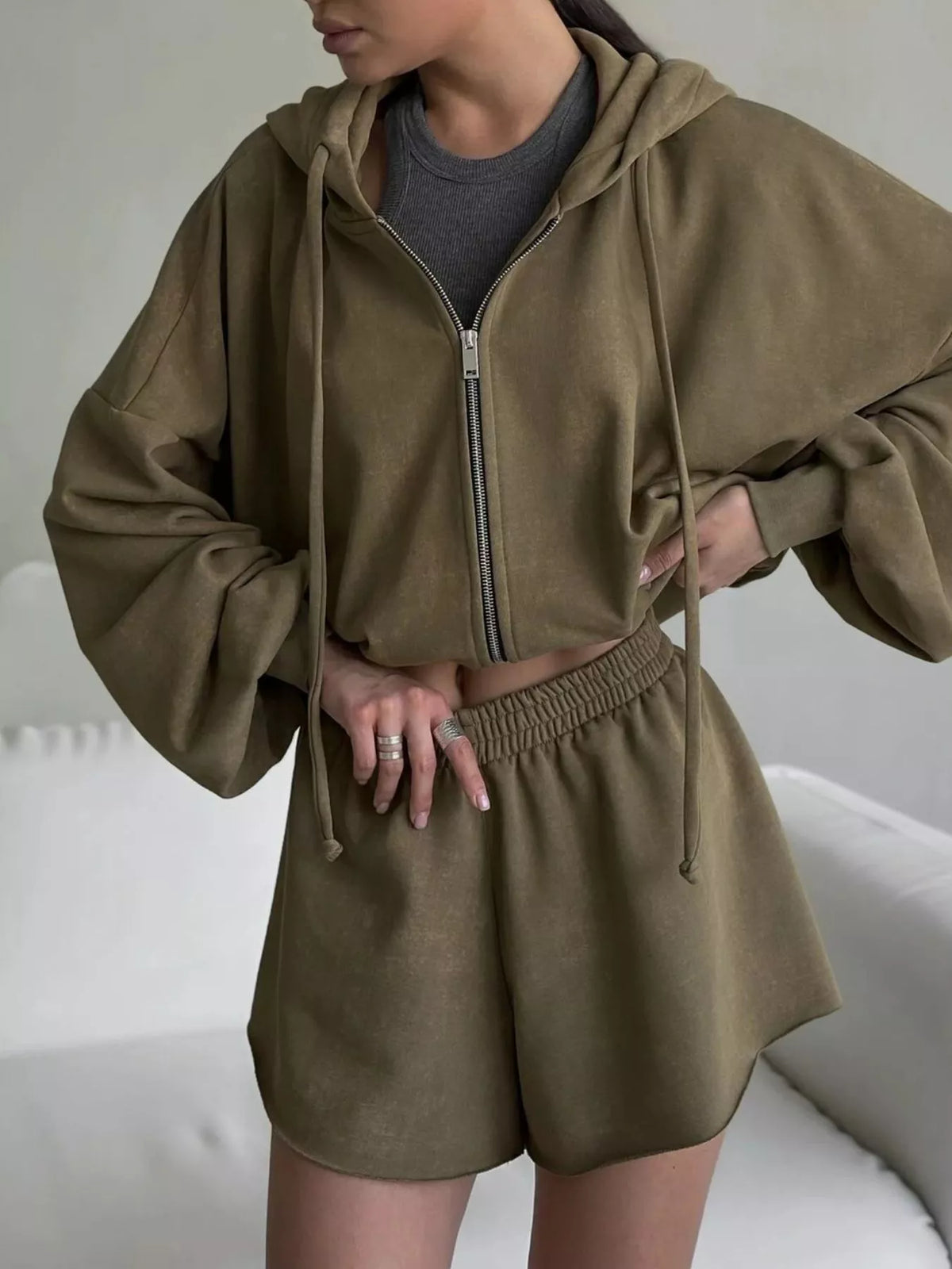 Plush Fashion Hub zip-up long sleeve outerwear and matching shorts set, casual athletic wear for comfortable style.