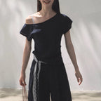 Linen off-shoulder asymmetric casual set by FitiqueFit in two colors, featuring relaxed fit and stylish design for everyday wear.