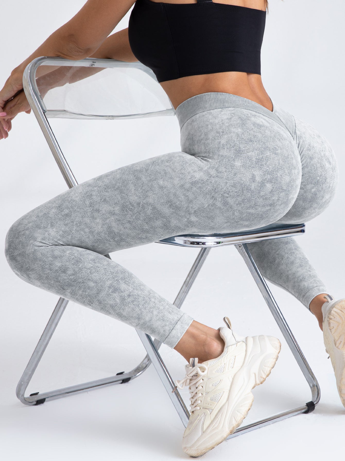 FitiqueFit V-back scrunch butt seamless yoga leggings designed for activewear, featuring a V-shaped back and form-fitting stretch fabric.