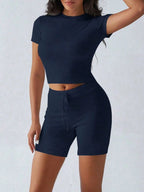Trendsi active wear set with a round neck short sleeve top and matching shorts, perfect for casual or workout wear.