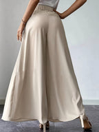 Women's high-waist pleated wide-leg linen pants from FitiqueFit, casual bohemian style with relaxed fit and lightweight fabric.