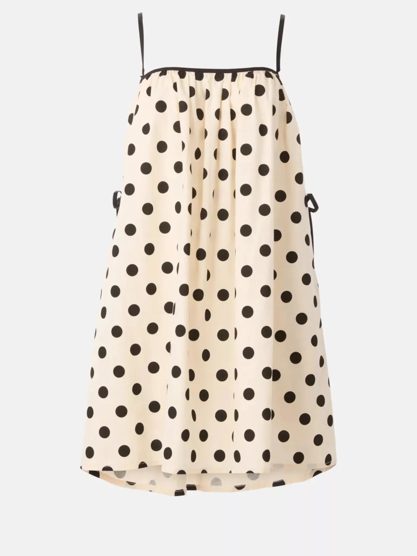 Polka dot spaghetti strap mini dress by Shopimist, featuring a playful pattern and lightweight fabric, perfect for summer wear.