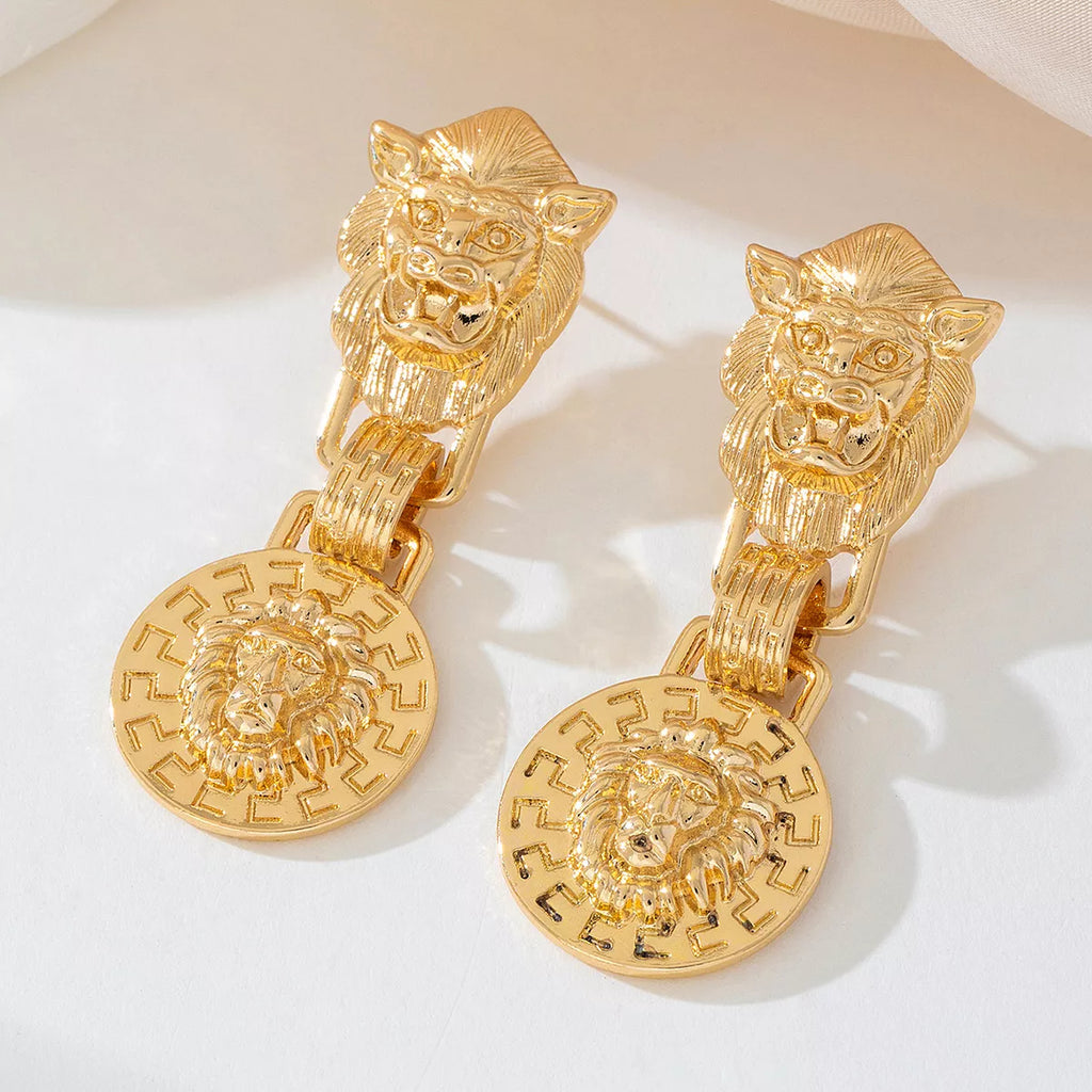 18K gold-plated lion head medallion drop earrings with detailed lion face design and elegant dangle style.