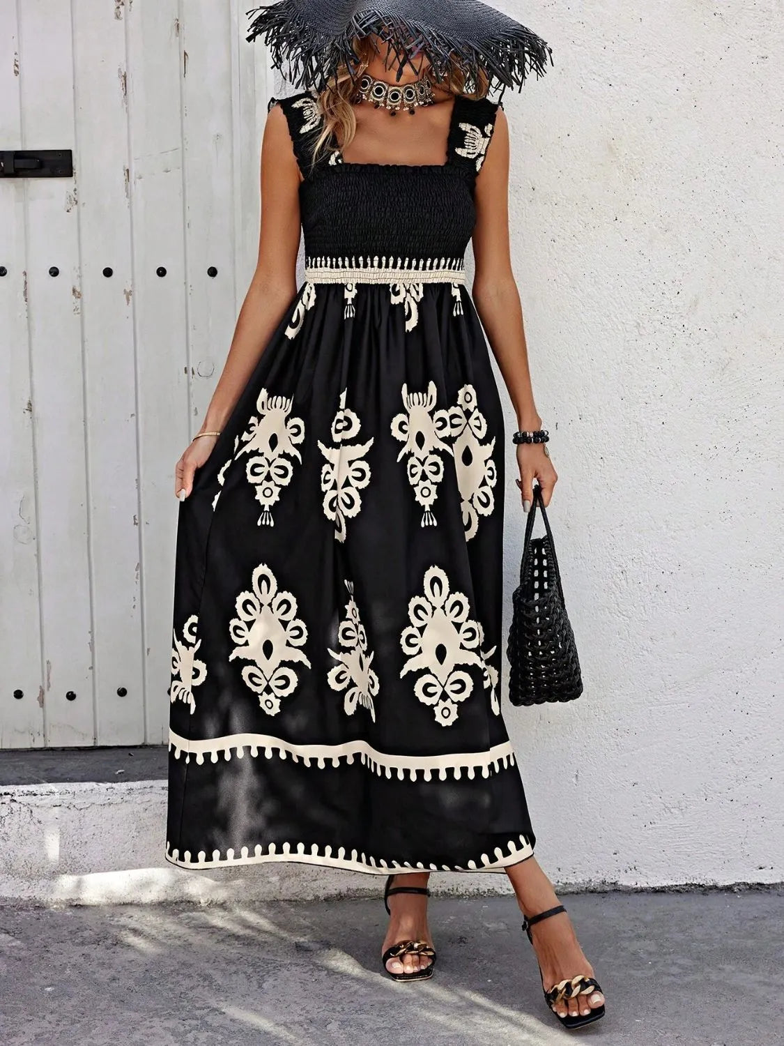Plush Fashion Hub smocked printed wide strap maxi dress with flowing fabric and floral print, perfect for summer wear.