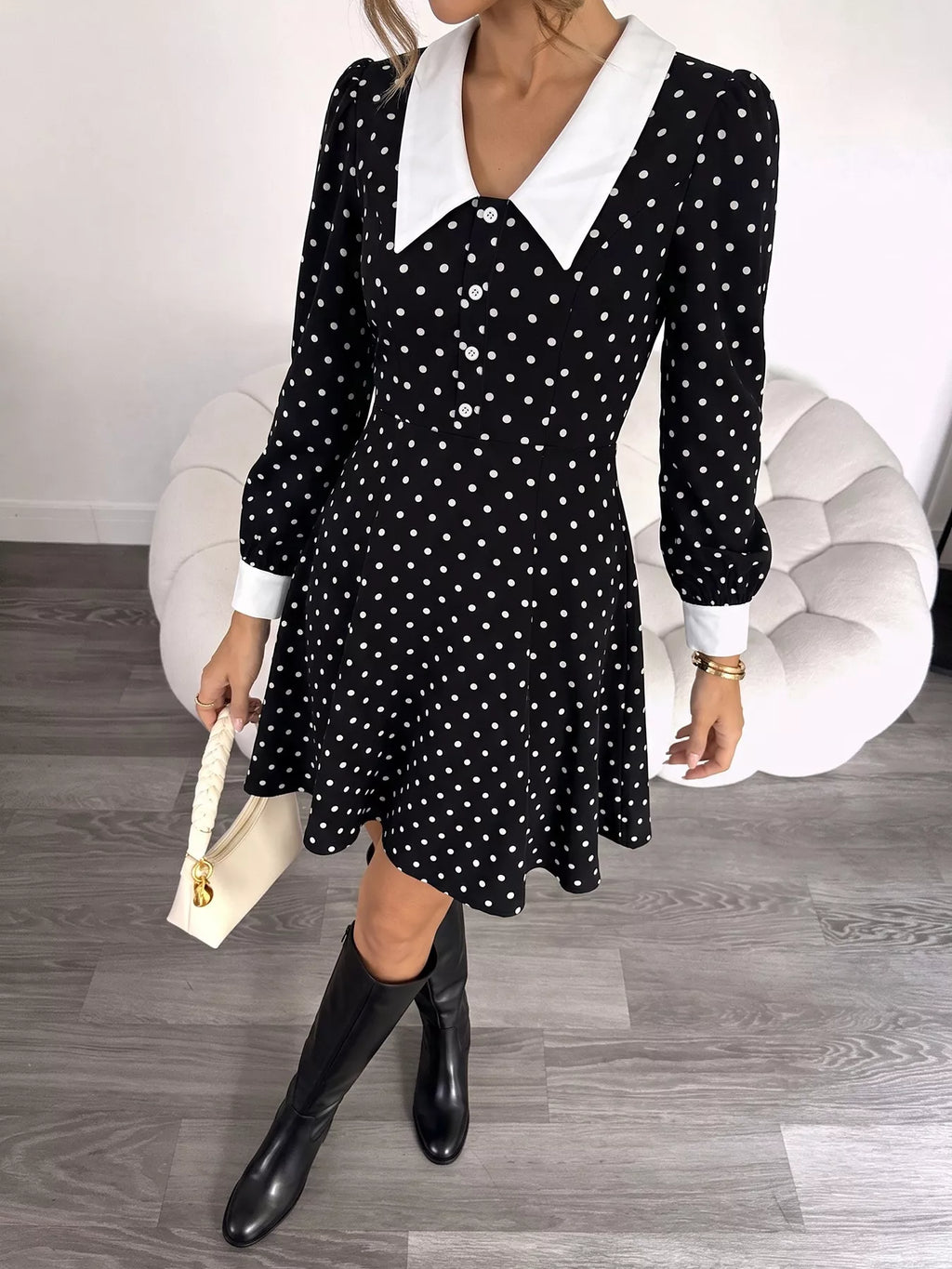 Polka dot Peter Pan collar dress by Shopimist featuring a classic design and a playful polka dot pattern.