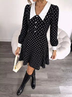 Polka dot Peter Pan collar dress by Shopimist featuring a classic design and a playful polka dot pattern.