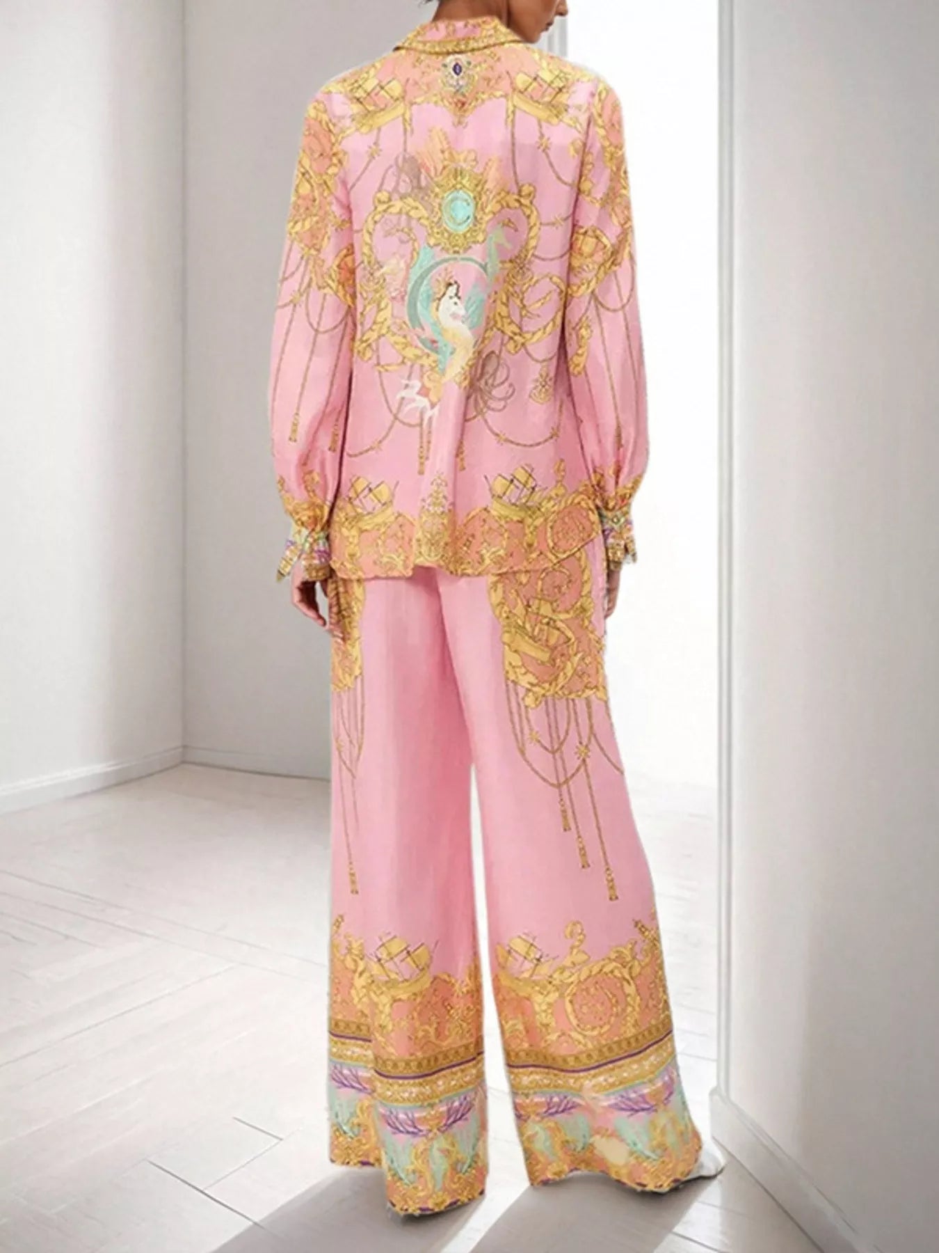 Women's printed lantern sleeve top and pants lounge set by Trendsi, featuring a comfortable, stylish matching clothing set.