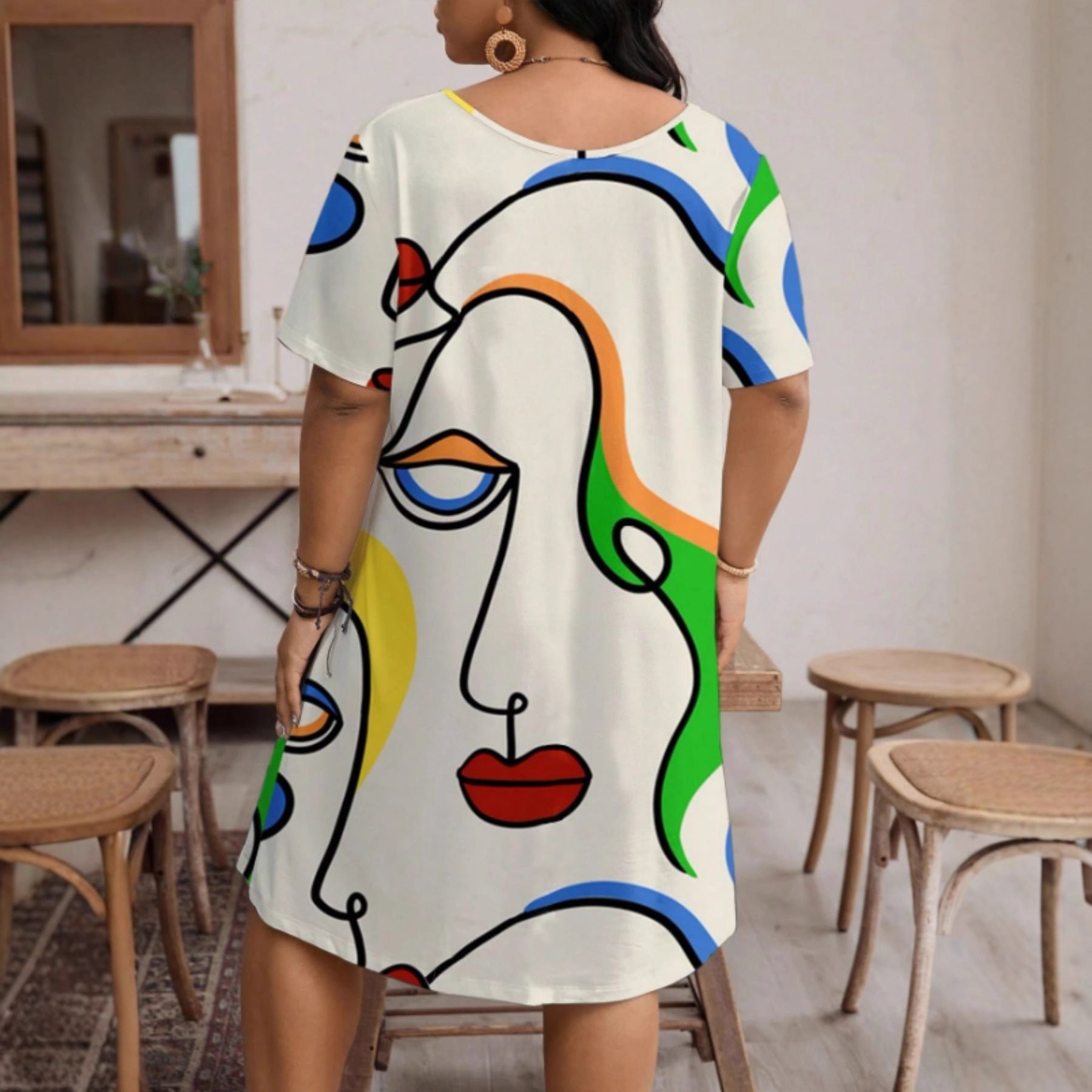 Women’s casual printed round neck short sleeve dress by Plush Fashion Hub, featuring a relaxed fit and stylish design.