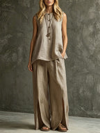 Casual women's two-piece set with sleeveless tank top and slit wide-leg pants in light fabric, by Plush Fashion Hub.