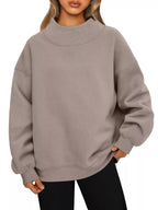 Women's oversized mock neck sweatshirt with dropped shoulders, casual style, from Trendsi, featuring a cozy pullover design.