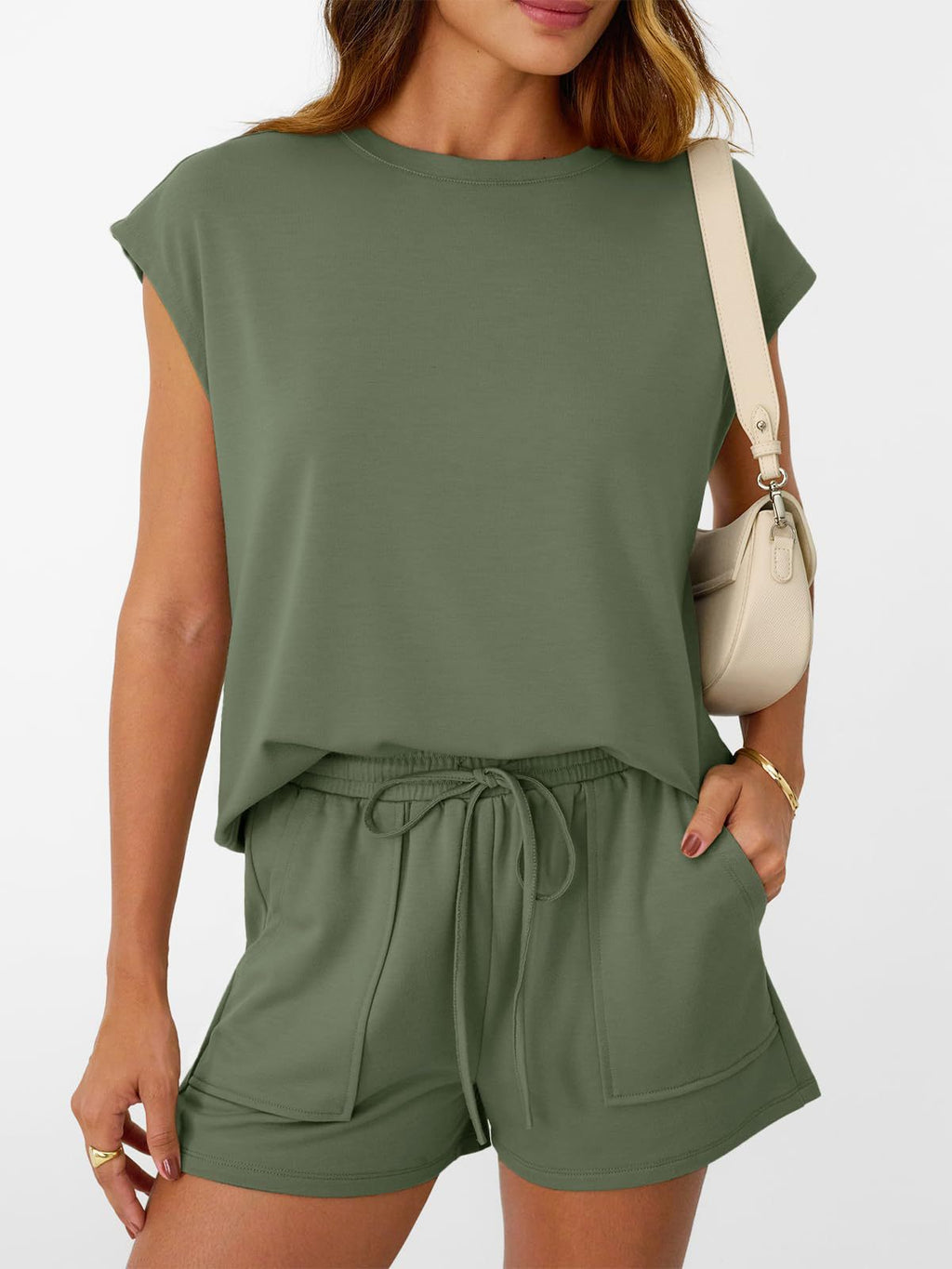 Women's plush lounge set with soft round neck top and drawstring shorts, featuring cap sleeves from Plush Fashion Hub.