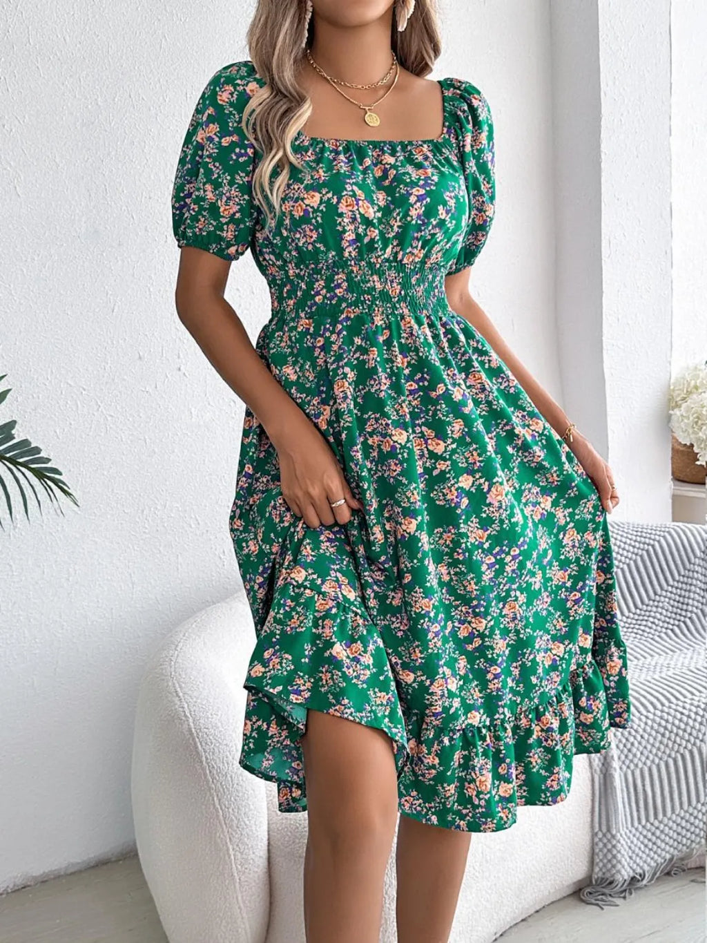 Shopimist ruffled hem floral puff sleeve dress with a feminine silhouette and vibrant floral pattern on lightweight fabric.