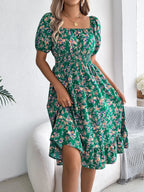 Shopimist ruffled hem floral puff sleeve dress with a feminine silhouette and vibrant floral pattern on lightweight fabric.