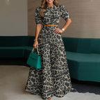 Printed top and trousers two-piece suit by FitiqueFit, featuring a coordinated set with a stylish, modern design.