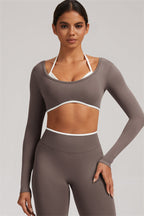 Fitglutes Activewear long sleeve crop top and matching leggings 2-piece set, perfect for gym and workout sessions.