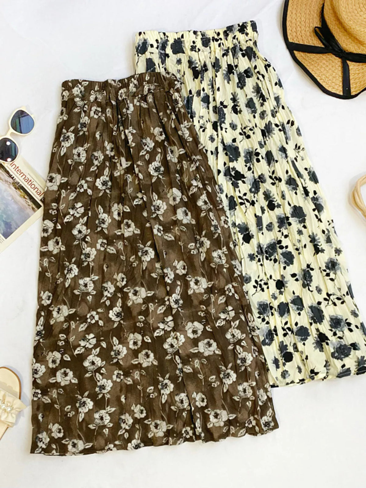 Floral print elastic waist midi skirt by Plush Fashion Hub, featuring a flowy fabric and vibrant flower pattern.