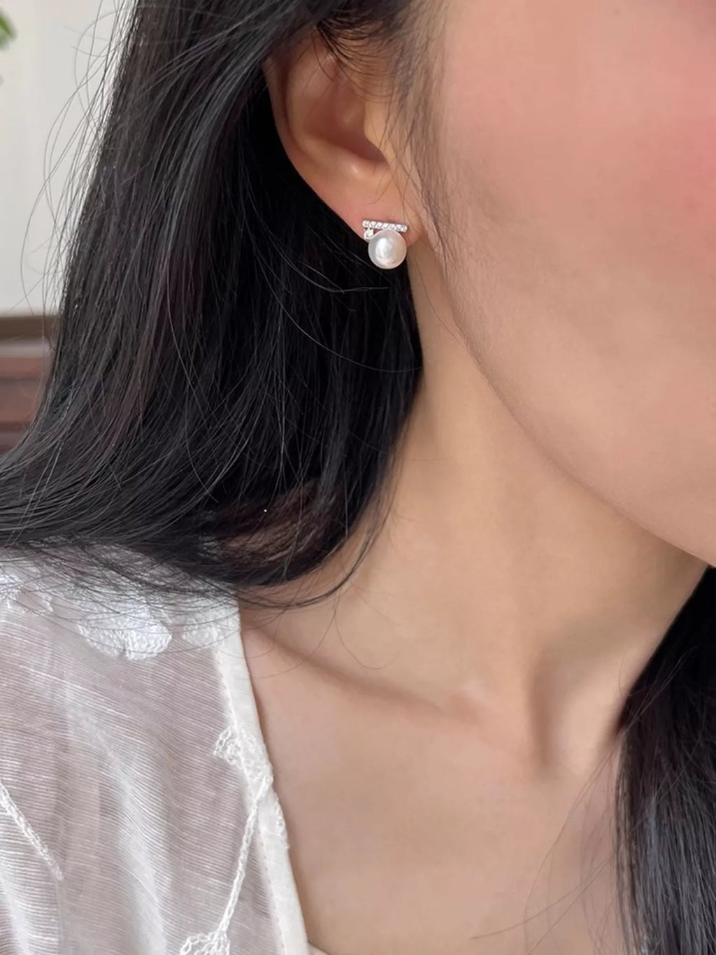 Shopimist zircon pearl stud earrings featuring sparkling cubic zirconia and elegant pearl accents on a classic stud setting.