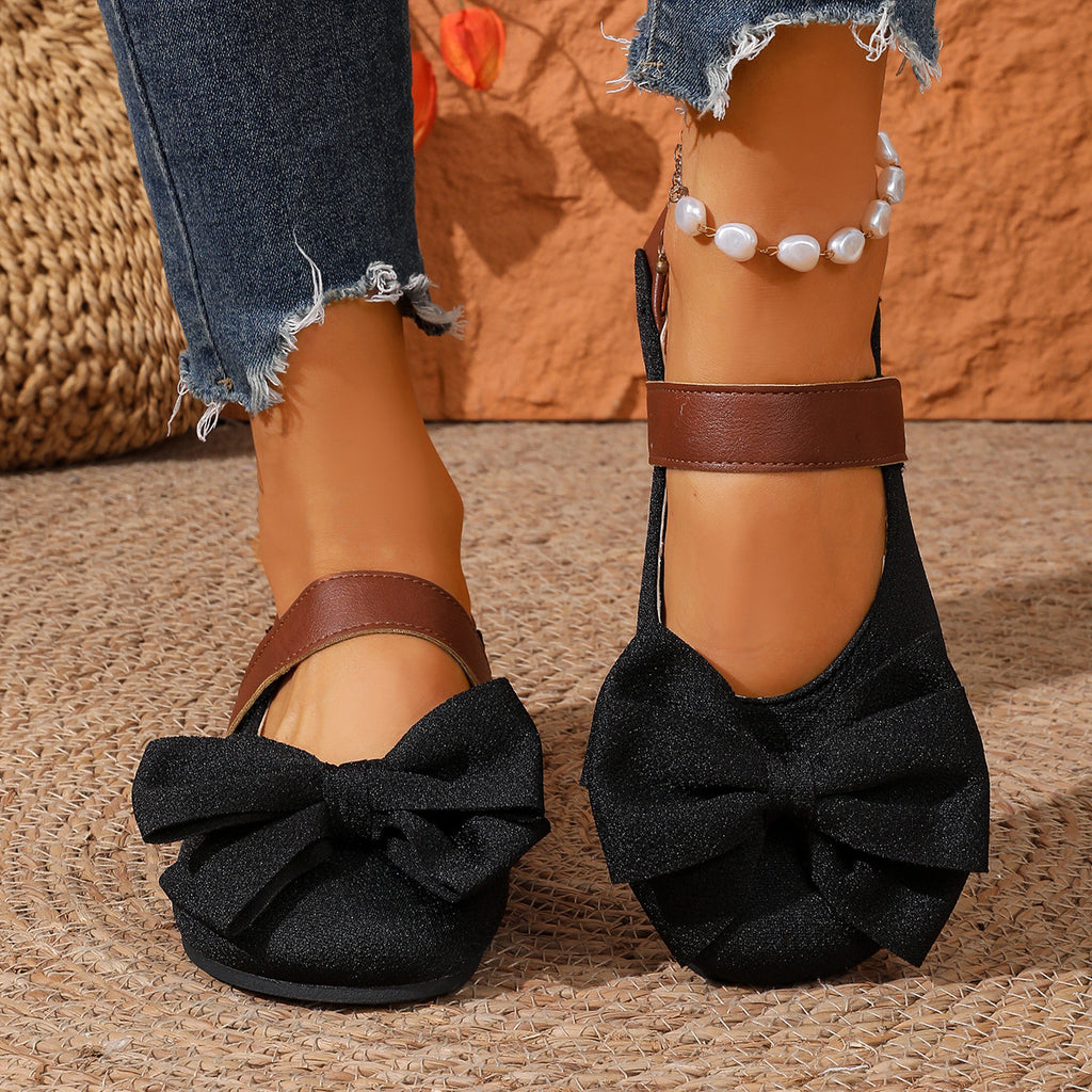 Women's chic bow round toe slip-on flats made of vegan leather, stylish and comfortable shoes by Trendsi.