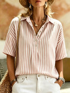 Women's striped short-sleeve shirt with turn-down collar from Plush Fashion Hub, showing a casual, stylish top with horizontal stripes.