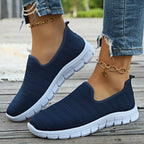 Women's breathable mesh slip-on casual walking flats by Trendsi, lightweight comfortable shoes for everyday wear.