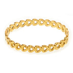18K gold-plated stainless steel heart bracelet with delicate chain and charm, featuring elegant, shiny finish and stylish design.