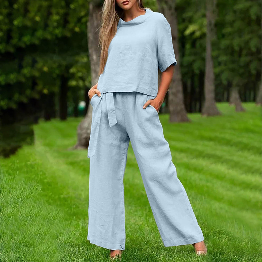 FitiqueFit activewear two-piece set with round-neck 3/4 sleeve top and matching pants in six colors, available in sizes S to XXL.