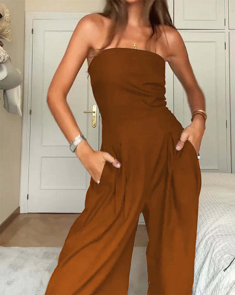 Backless loose tube-top jumpsuit with wide-leg long pants, stylish women's overalls in beige from Plush Fashion Hub.