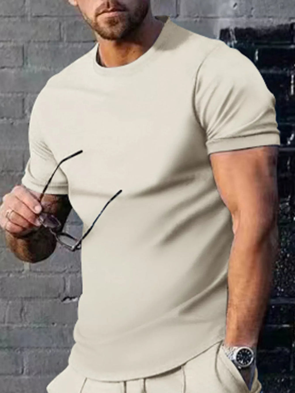 Plus size men's casual T-shirt by Trendsi in solid color, featuring a comfortable fit and classic crew neckline.