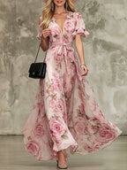 Women's deep V-neck ruffle sleeve printed maxi dress by FitiqueFit, featuring high waist and flowing fabric.