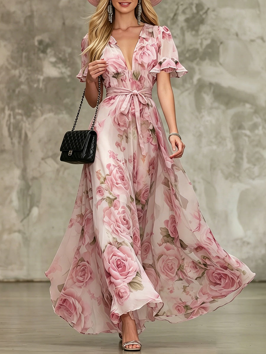 Women's deep V-neck ruffle sleeve printed maxi dress by FitiqueFit, featuring high waist and flowing fabric.