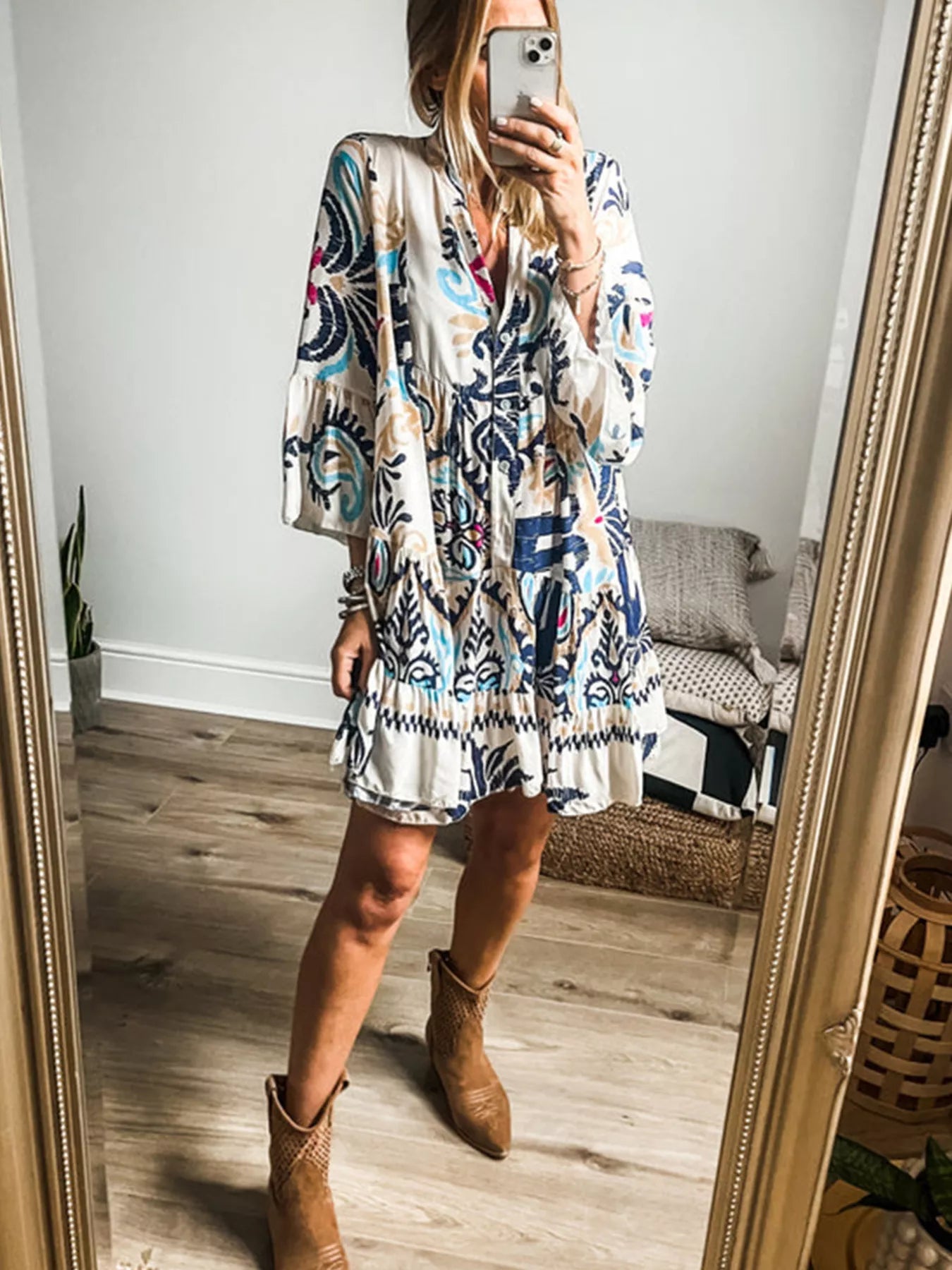 Bohemian print tiered mini dress by Shopimist featuring colorful patterns, lightweight fabric, and a relaxed, flowy silhouette.