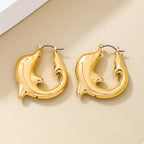18K gold-plated dolphin hoop earrings with detailed dolphin design, lightweight and stylish jewelry from Shopimist