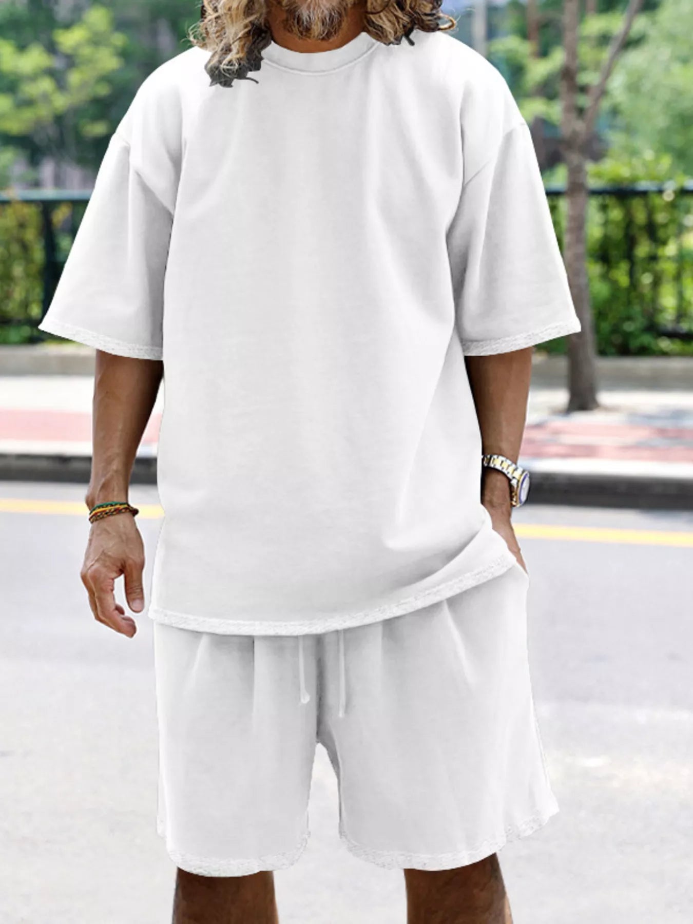 Men's relaxed fit T-shirt and shorts set by Trendsi, plus size casual tops and shorts combo for comfortable, everyday wear.