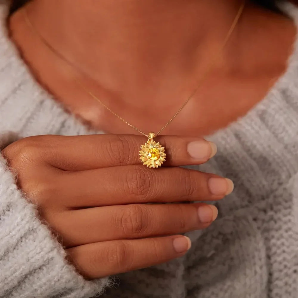18K gold-plated sunflower-shaped pendant necklace featuring a detailed floral design, perfect for elegant accessories.