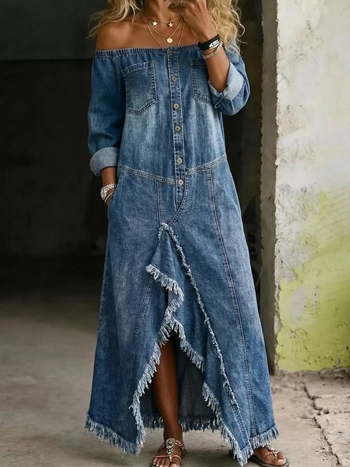 Plus size off-shoulder raw hem slit denim maxi dress by Trendsi, featuring a full-length design with a stylish, relaxed fit.
